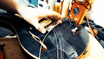 Change strings on an electric guitar