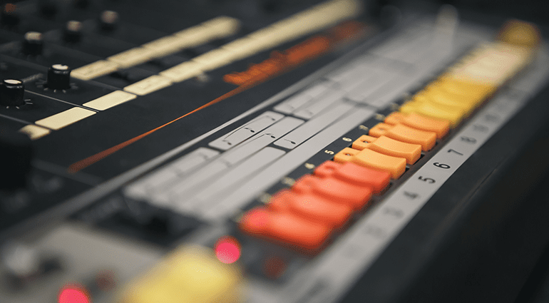 Close-up of a Roland TR-808 drum machine, featured in legendary tracks like “Sexual Healing” and “Psycho Killer”