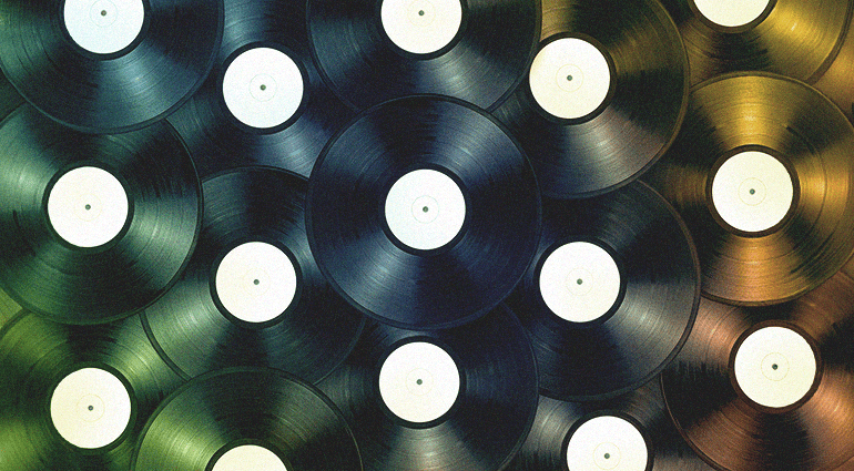 Collage of vinyl records representing iconic albums in music history
